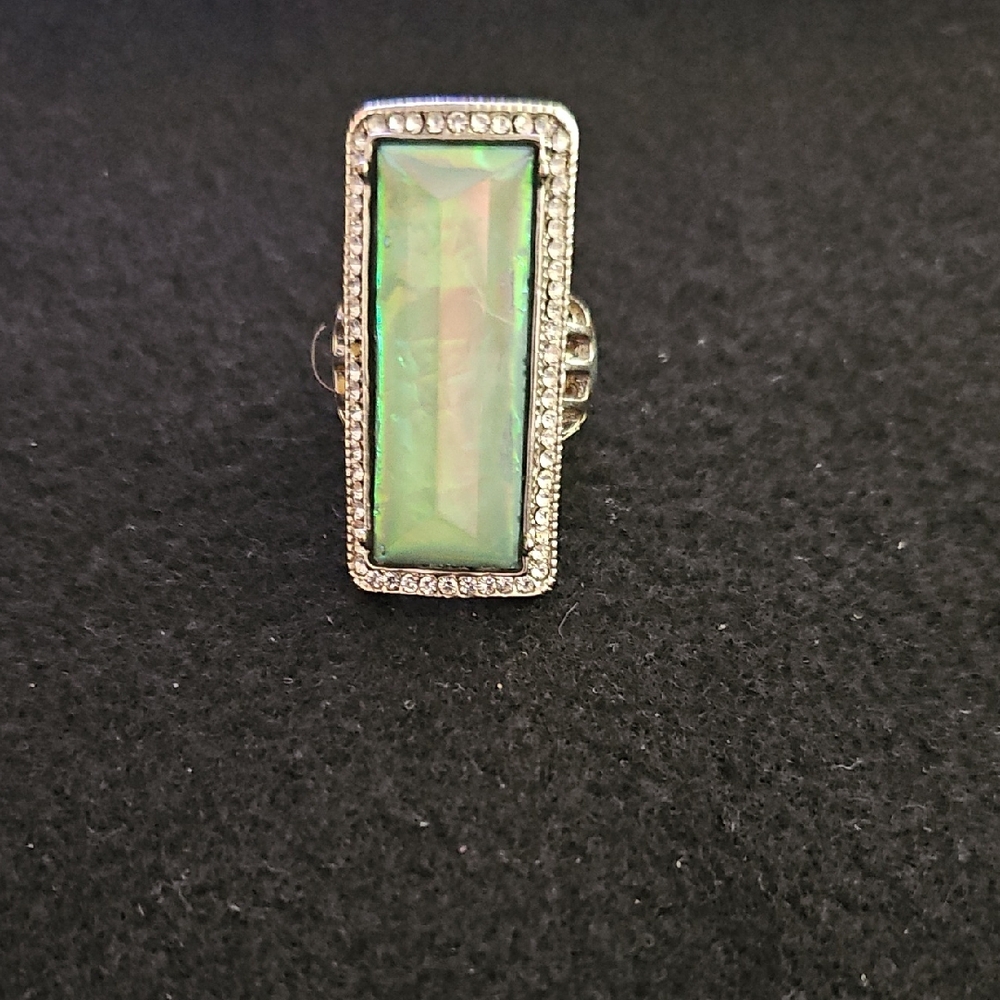 Elegant Silver Ring with Green Gemstone